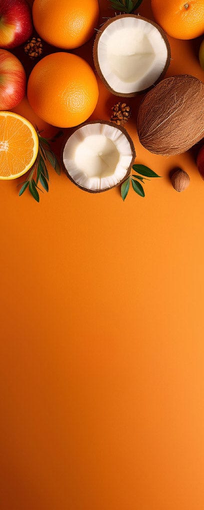 Vielfältige Früchte wie Äpfel, Orangen und Kokosnüsse auf orangefarbenem Hintergrund, perfekte Mischung für gesunde Ernährung.