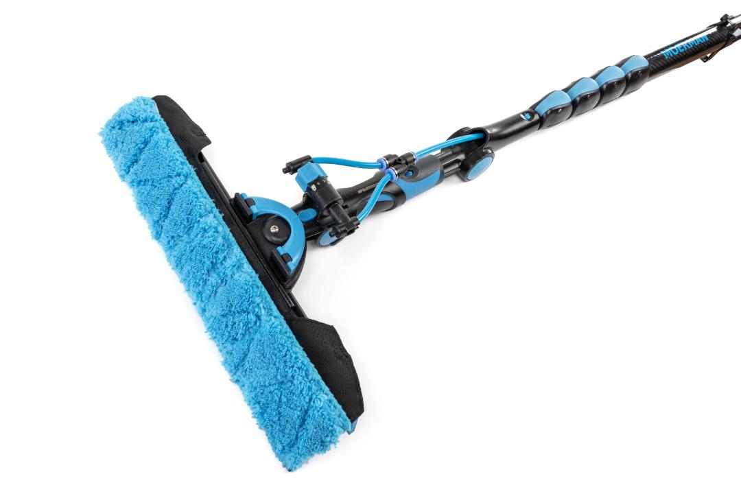 Moerman Spray-Ray Glasreinigungs-Sprühsystem mit blauer Mikrofaser-Bürste für effiziente Fensterreinigung.